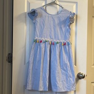 Girls seersucker dress with rainbow fringe